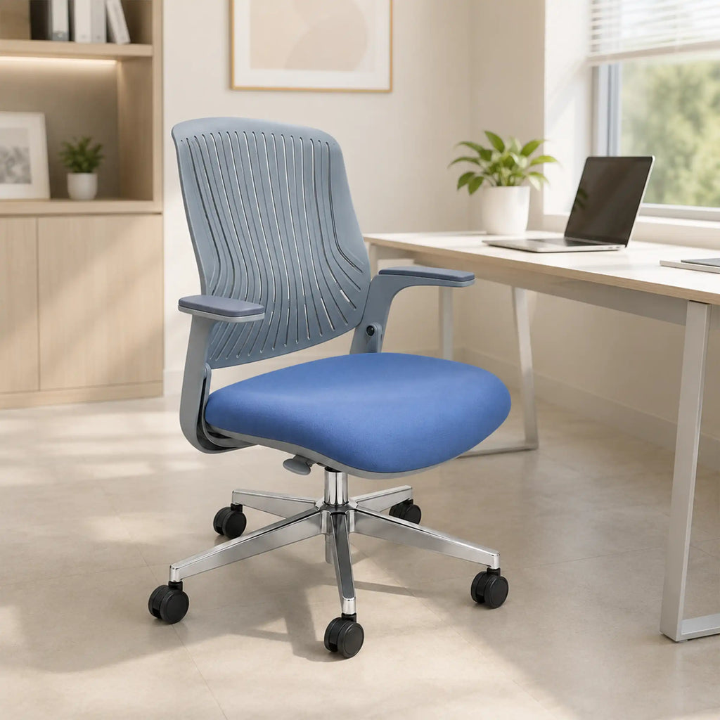 Modern blue and gray ergonomic office chair placed in a bright home office setting beside a desk and window.