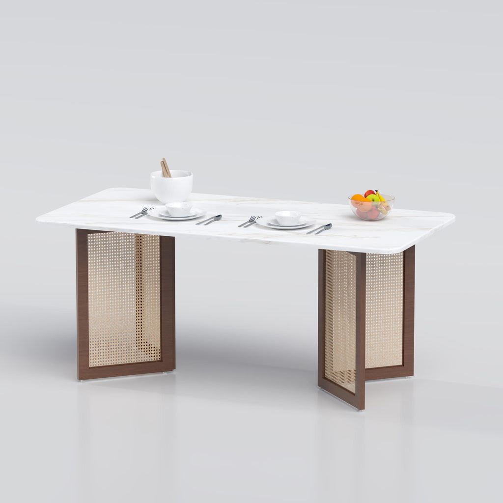 Durable dining table with a white and rattan base, offering a blend of practicality and sophistication.
