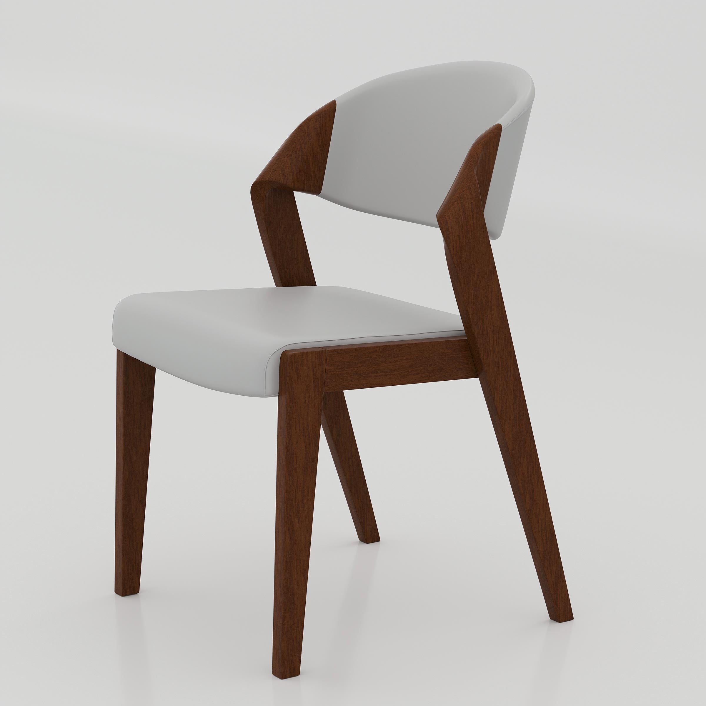 The Kelvo Dining Chair brings comfort and elegance together with its soft foam seat, smooth Rexine finish, strong wooden structure, and stylish curved backrest.