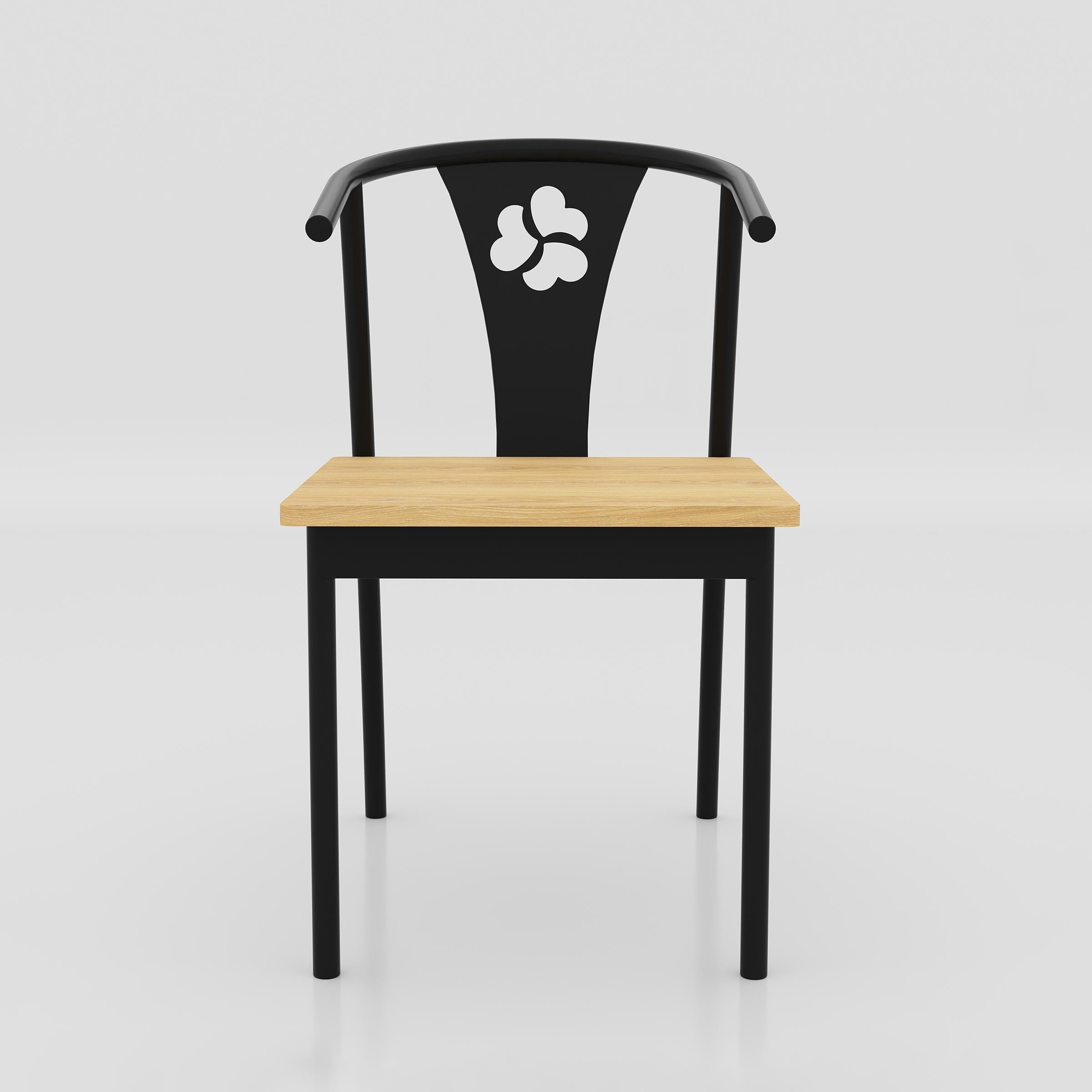 Kerox café chair with a curved back support, black metal structure and lacquer-finished seat for contemporary hospitality interiors.