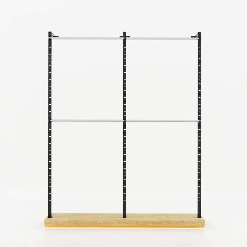 Olira boutique cloth stand featuring tall black metal uprights, stainless steel rails and a lower platform for folded garments.