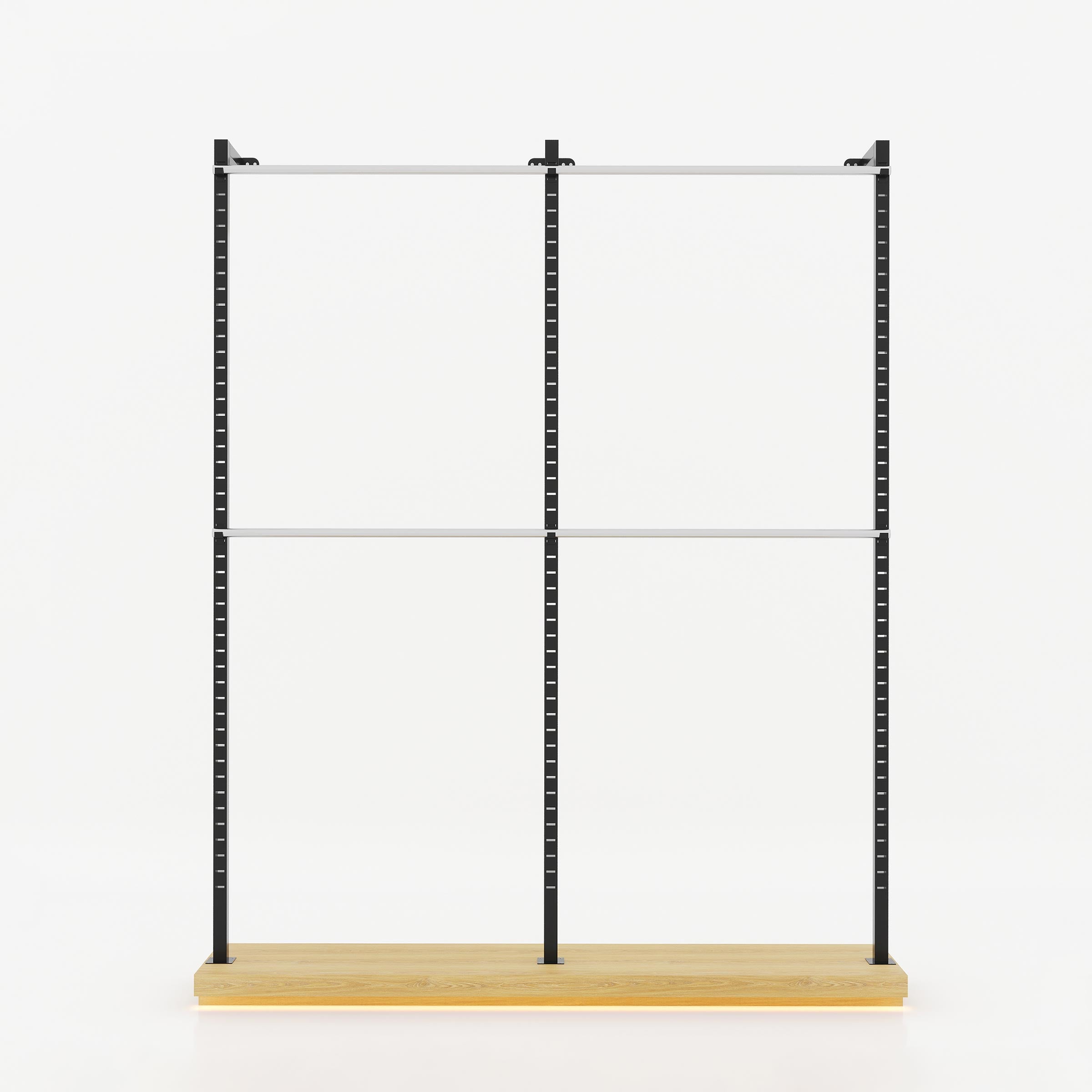 Olira boutique cloth stand featuring tall black metal uprights, stainless steel rails and a lower platform for folded garments.