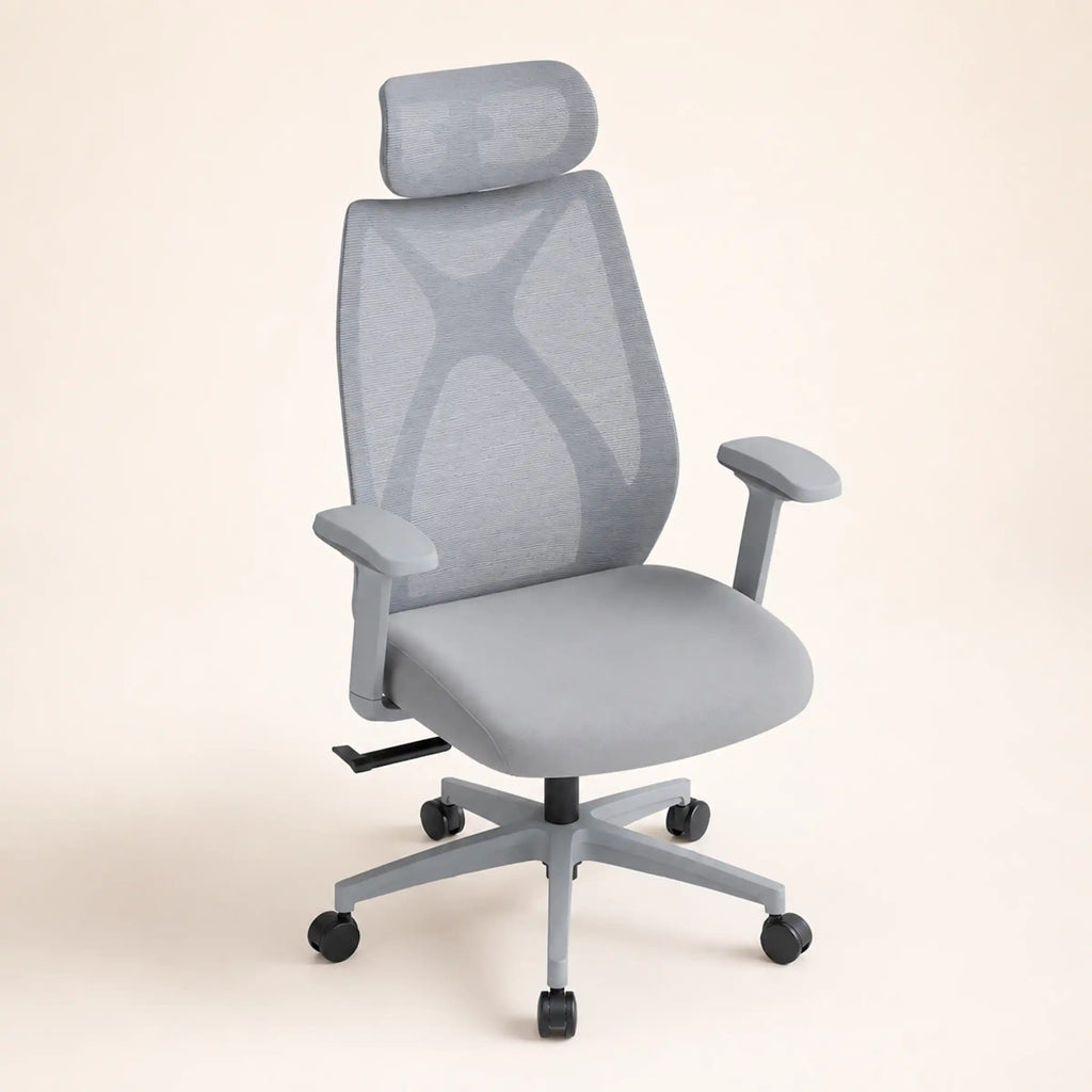 Rear view of grey Prime Ergonomic Chair showing durable PVC shell, mesh back support and five-star caster base.