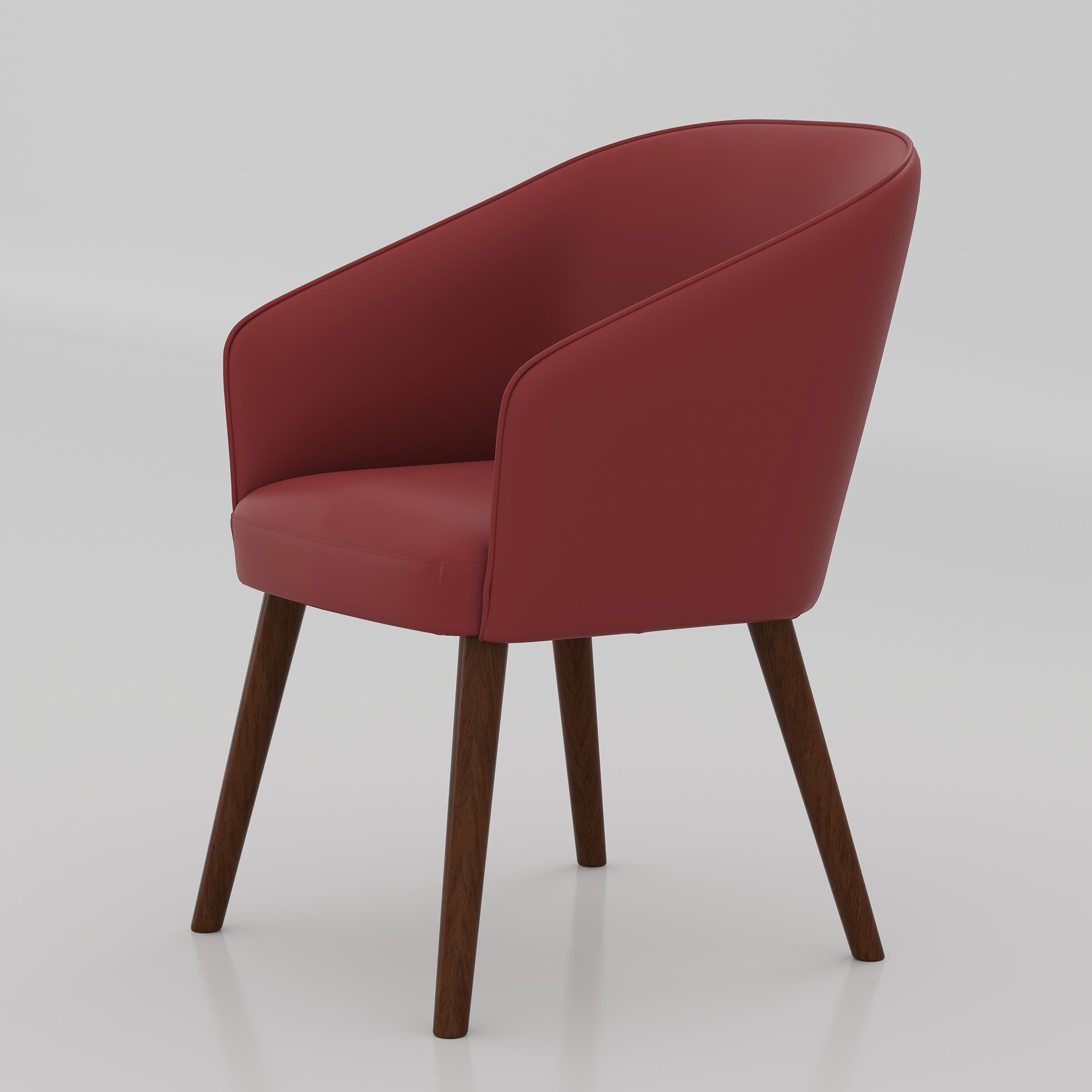 The Ralox Dining Chair brings comfort and style together with its soft foam seating, smooth Rexine finish, curved back support, and warm wooden-leg look.