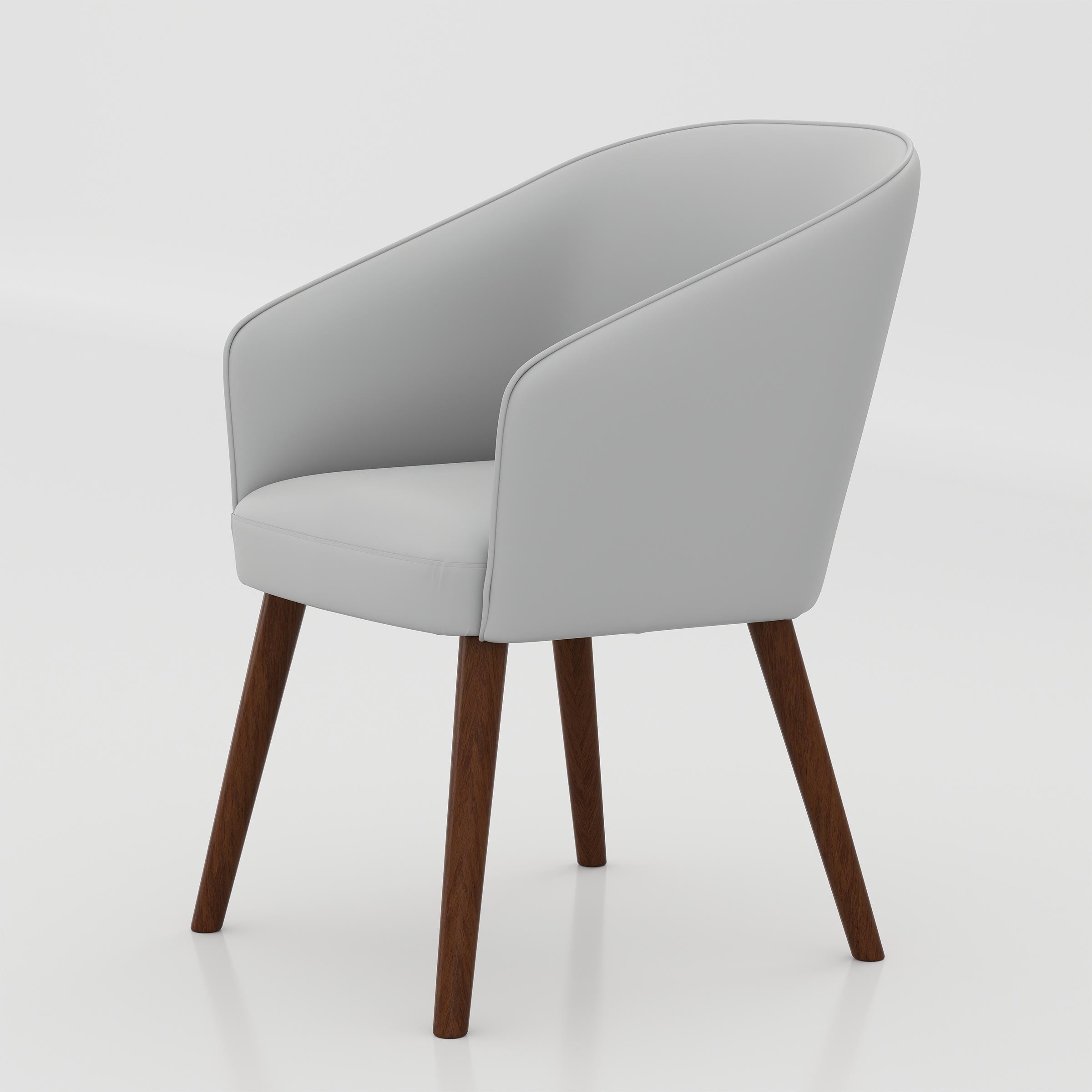 Create a welcoming dining area with the Ralox Dining Chair, offering soft seating comfort, a refined curved profile, and a clean modern look for daily use.