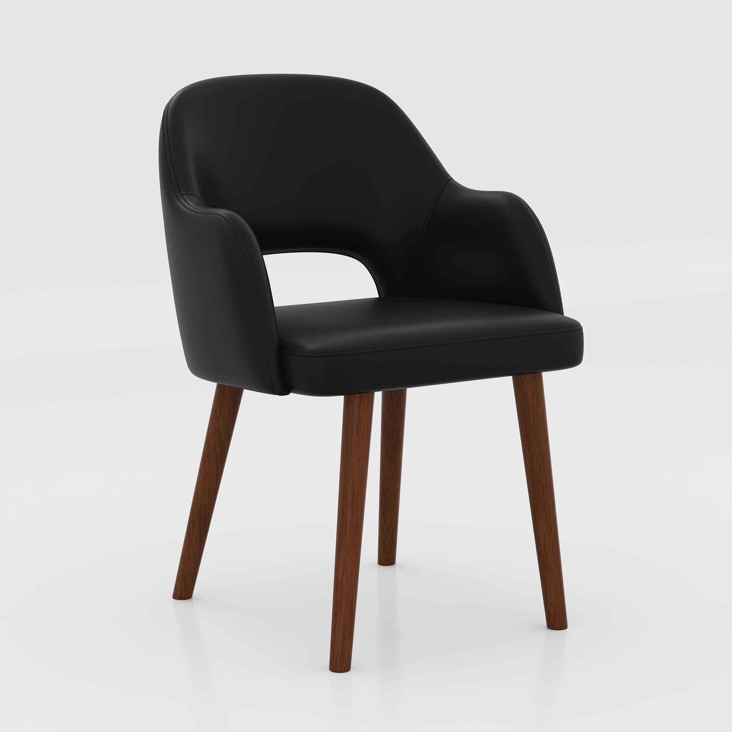 Upgrade your dining space with the Ravel Dining Chair, featuring a curved armrest-style back, cushioned Rexine seat, wooden legs, and a modern elegant look.