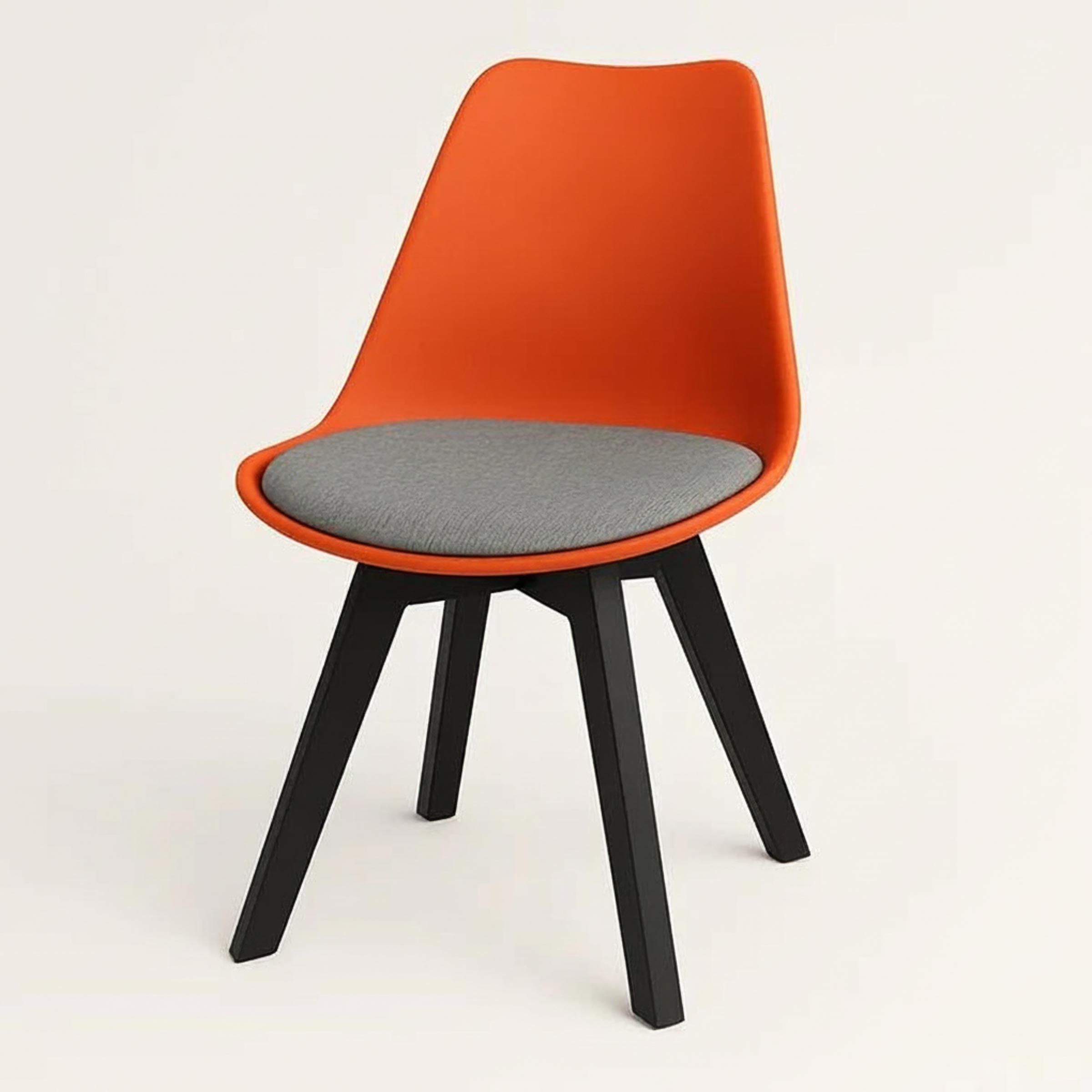Stylish Tulip Indoor Chair with cushioned seat and durable PVC shell. Perfect for dining, living, or as a dinner wagon chair. Available in 9 colors.