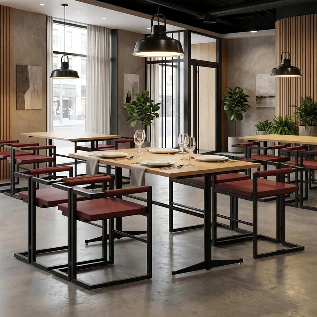 Modern Zelon Dining Chair featuring a geometric black metal frame and padded rexine seat for stylish commercial dining.